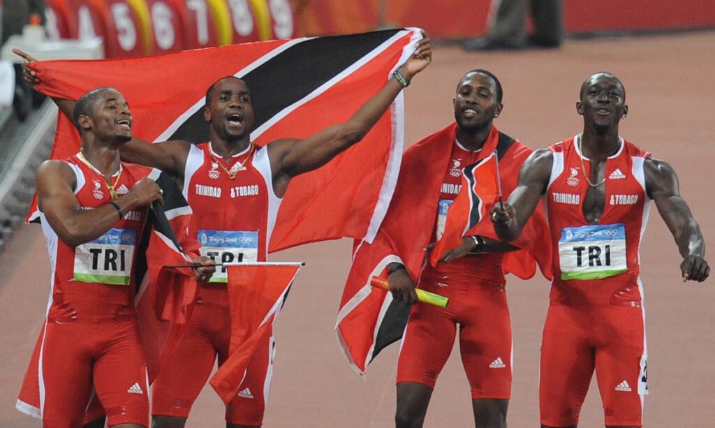 In this August 22, 2008 file photo, (from left) TT's Keston Bledman, Emmanuel Callender, Richard Thompson and Marc Burns celebrate after finishing second in the men's 4×100 metres relay final at the National Stadium during the 2008 Beijing Olympic Games. - (AFP Photo)
