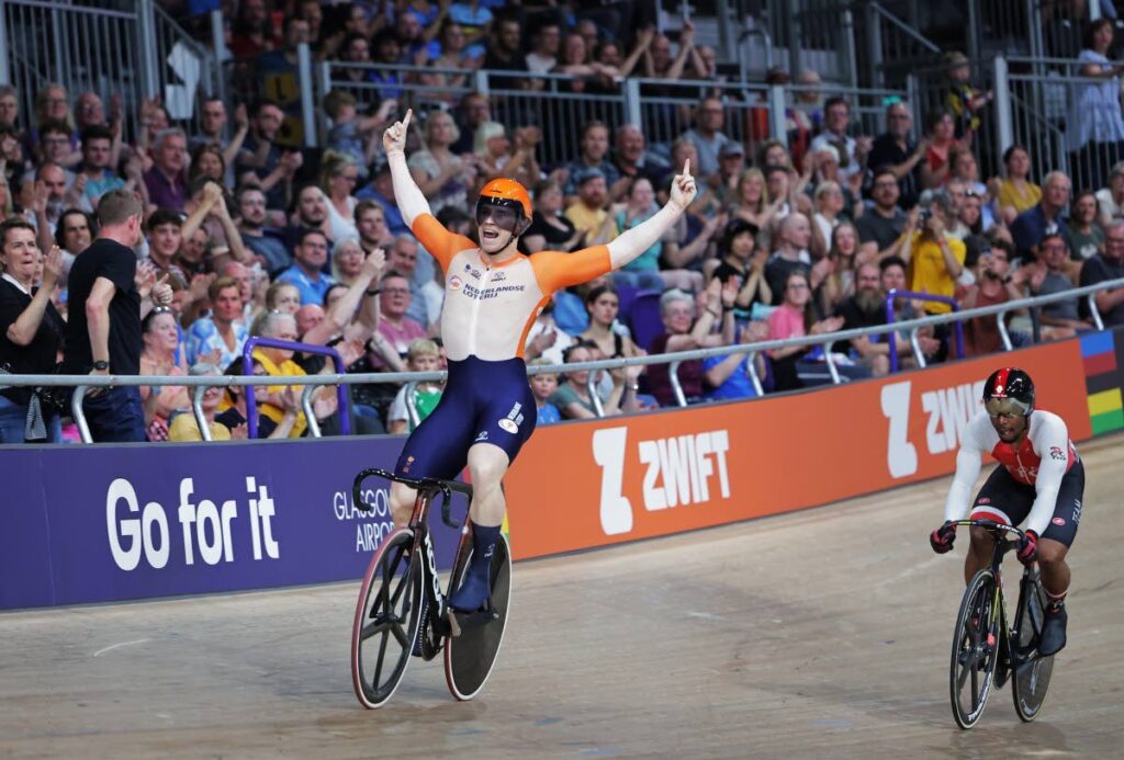 Dutchman Harrie Lavreysen soaks in the applause of the crowd at the Sir Chris Hoy Velodrome, after beating TT's Nicholas Paul, right, in the World Championships men's sprint final in Glasgow, Scotland, Monday. - UCI (Image obtained at newsday.co.tt)