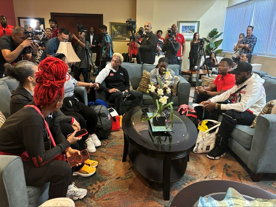 T&T’s 2024 Olympic Games athletes and officials returned home yesterday. Among them were Michelle-Lee Ahye, left, and sprinter Elijah Joseph, right. The contingent was welcomed by the SporTT at the VIP Lounge, Piarco.  Courtesy Don Lee (Image obtained at guardian.co.tt)