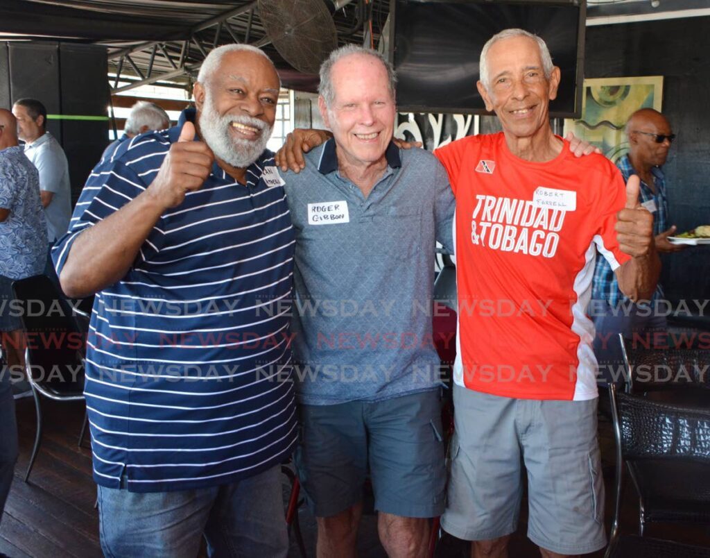 Former TT cyclist and San Fernando Mayor Ian Atherly, left, shares a moment with fellow colleagues Roger Gibbon, centre, and Robert Farrell at the TT veteran cyclists' reunion at Atherly’s By the Park, San Fernando, on September 28. - Photos by Innis Francis (Image obtained at neasday.co.tt)