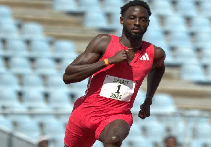FLASHBACK: Jereem “The Dream” Richards sails through his NAAATT/NGC National Senior Championship men’s 200 metres qualifying round heat at the Hasely Crawford Stadium in Port of Spain, two Sundays ago. Richards won the race in 21.05 seconds, and went on to strike gold in the final in 20.21. —Photo: DENNIS ALLEN for @TTGameplan (Image obtained at trinidadexpress.com)