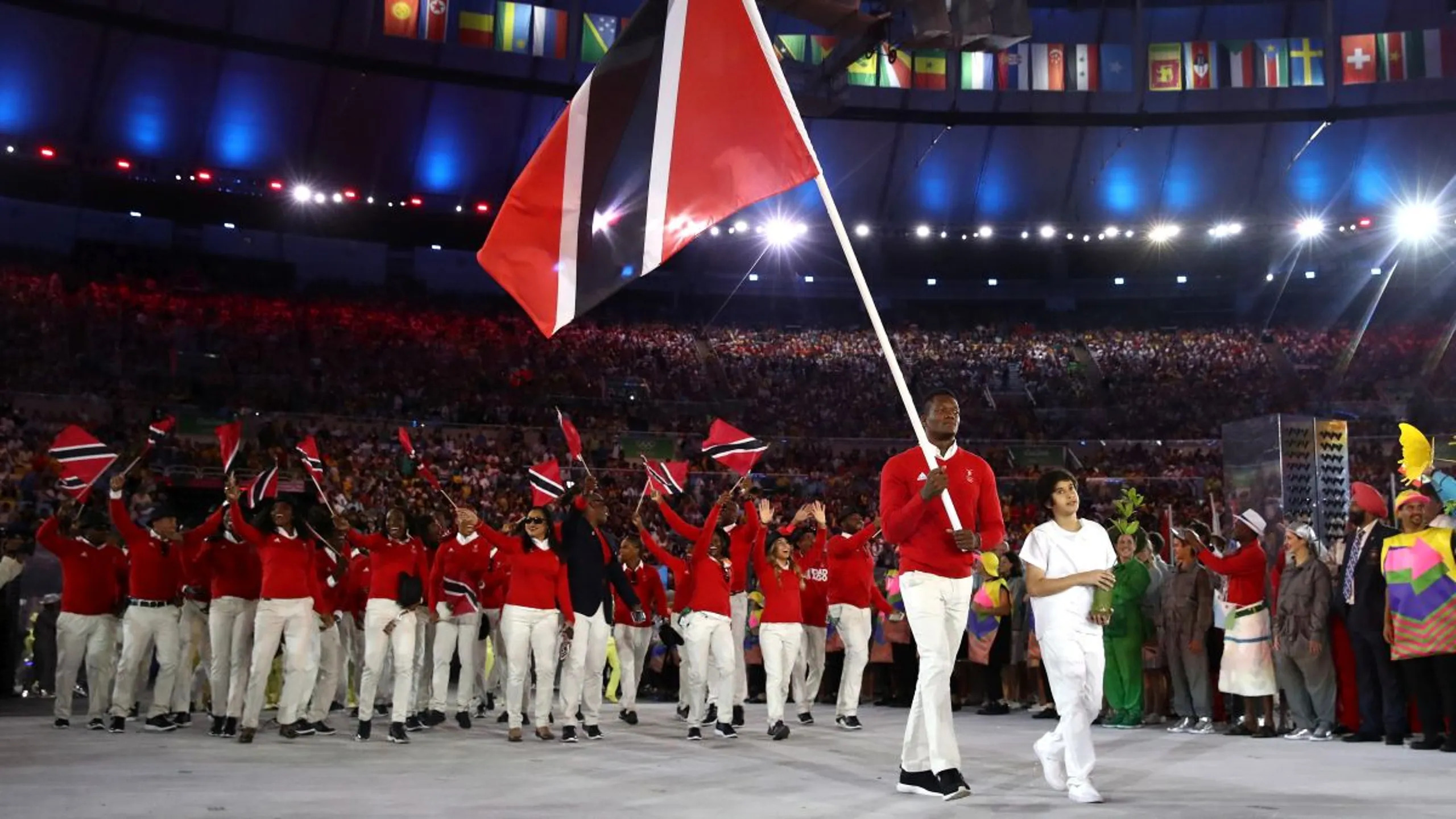 Keshorn Walcott of Trinidad and Tobago carries the flag during the Rio 2016 Opening Ceremony. Cameron Spencer/GETTY IMAGES (Image obtained at insidethegamez.biz)