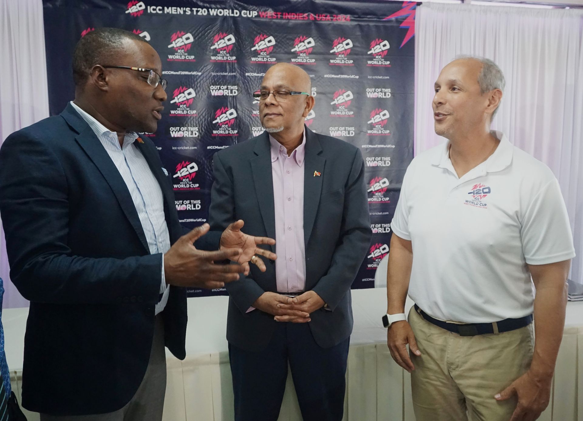 Permanent Secretary in the Ministry of Sports and Community Development David Roberts, left, with CWI vice president/TTCB president Azim Bassarath, and head of PR ICC Men’s T20 World Cup Damon Leon chat after ICC Men’s T20 World Cup press conference at the President’s Box Queen’s Park Oval, St Clair, Port-of-Spain, yesterday.  KERWIN PIERRE (Image obtained at guardian.co.tt)